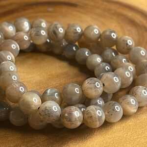 Skeleton skeletal moonstone stretch beaded bracelet 7” crystal healing beads 8mm